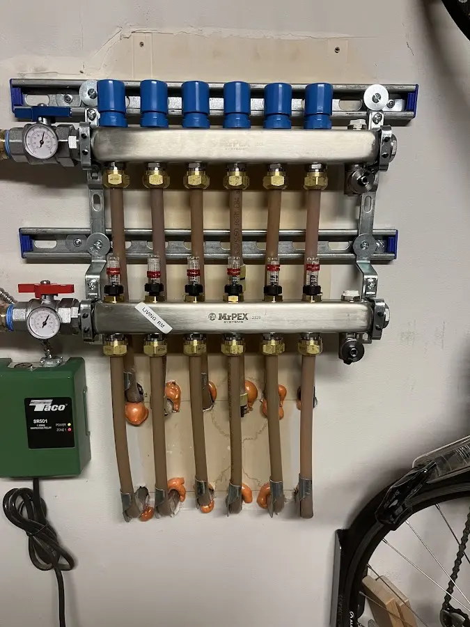 Plumber performing Water Heater Repair at a residential property in Decatur